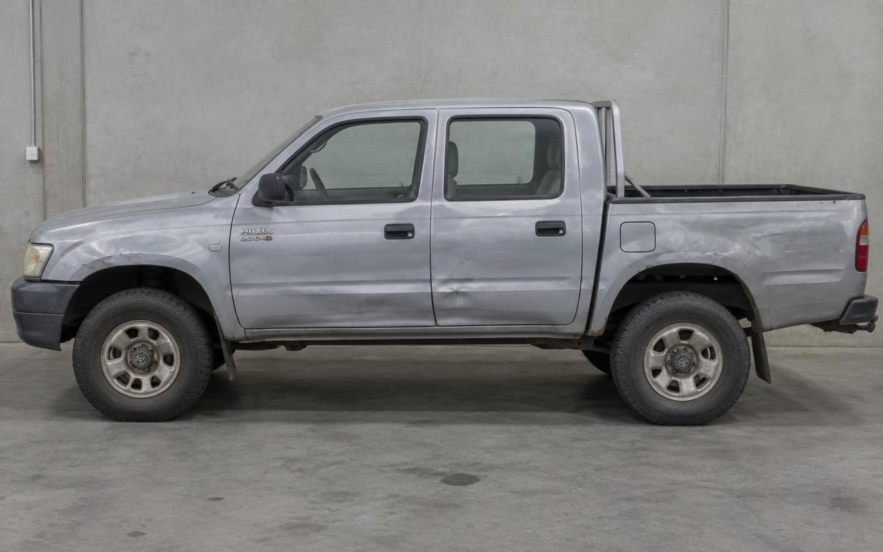 Silver Toyota Hilux — before